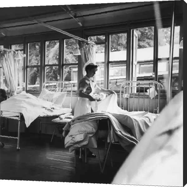 Nurse Making a Bed