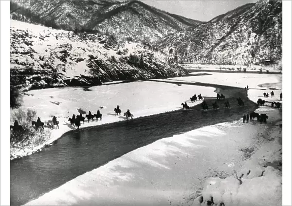 Serbian cavalry crossing a river in the snow, WW1