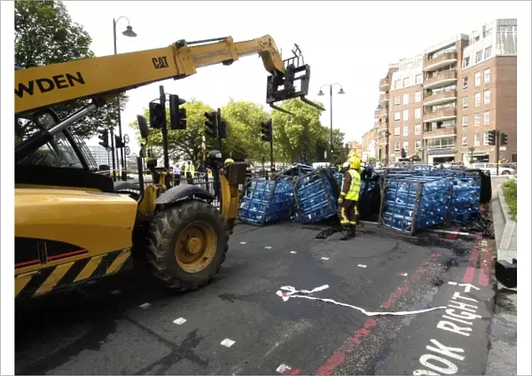 An overturned lorry spills its load, Cheyne Walk