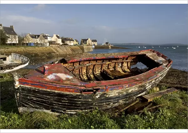 Old Boat on shore by harbour. Le Fret, Brittany, France