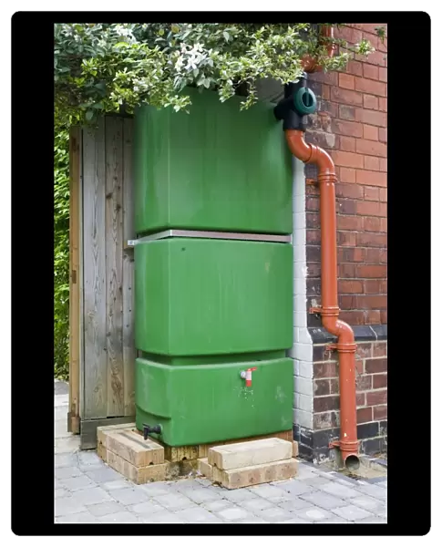 Water Tank - Large green rectangular plastic water storage tank collecting rainwater from roof Cheltenham UK