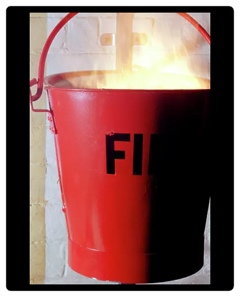 Fire. Conceptual image of a fire inside a container normally used by fire