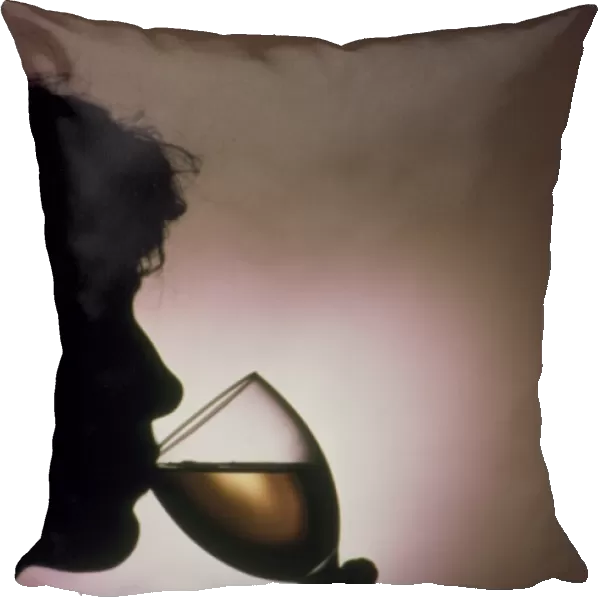 Person drinking alcohol, silhouette