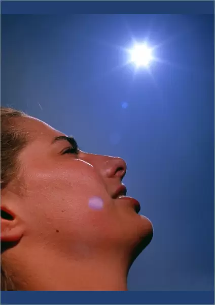 Womans face with sun