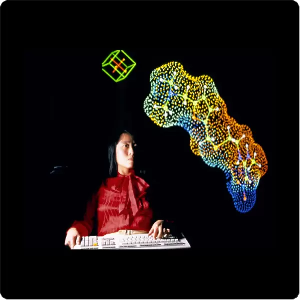 Scientist w  /  computer 3D image of complex molecule