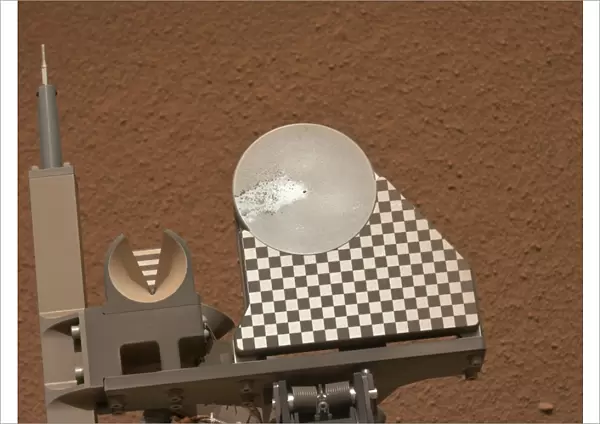 Curiosity rover collecting Martian soil C015  /  6507