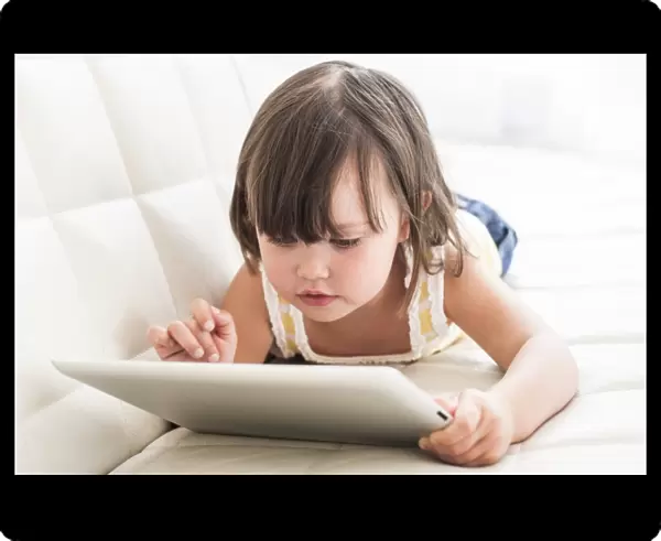 Toddler using a tablet computer