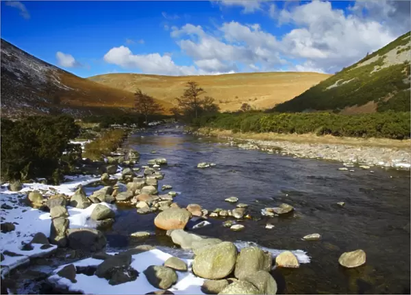 England, Northumberland, Northumberland National Park. A winter scene with the remains of snow on the river Breamish, running through the Cheviots and the Breamish valley near the village of Ingram situated within the Northumberland National Park