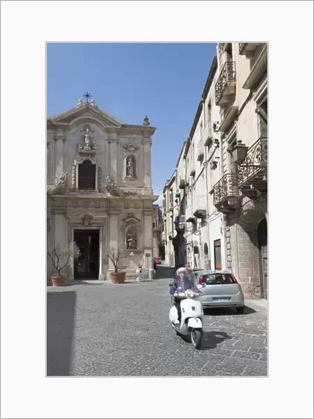 Motor scooter and Cattedrale di San Cataldo in Taranto, Basilicata, Italy, Europe