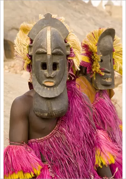 Portrait of masked ceremonial Dogon dancers near Sangha, Bandiagara escarpment