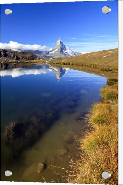 The Matterhorn reflected in Stellisee, Zermatt, Canton of Valais, Pennine Alps, Swiss Alps