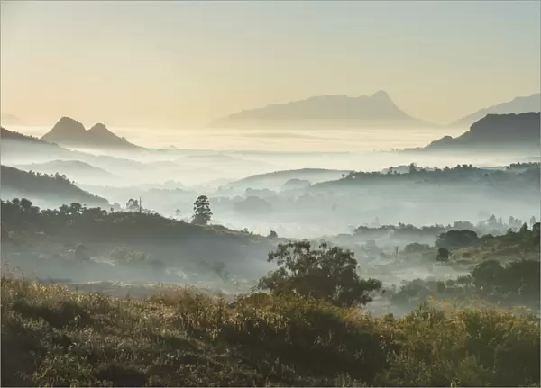 Sunrise and fog over the mountains surrounding Blantyre, Malawi, Africa