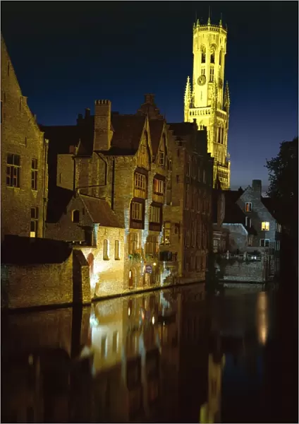 The Belfry of Belfort-Hallen illuminated at night, Bruges (Brugge), UNESCO World Heritage Site