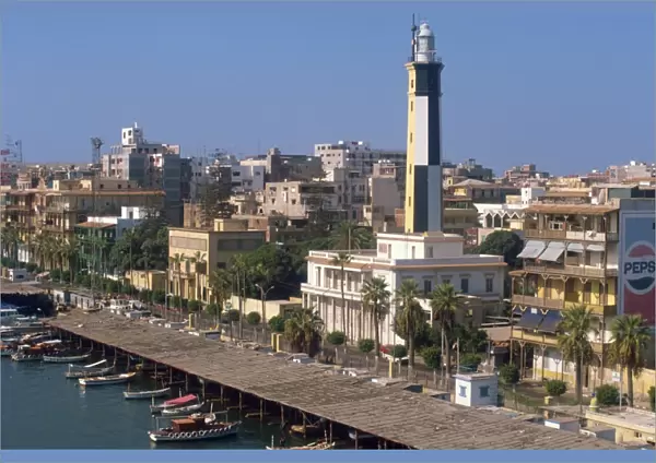 Waterfront skyline with lighthouse, Port Said, Egypt, North Africa, Africa