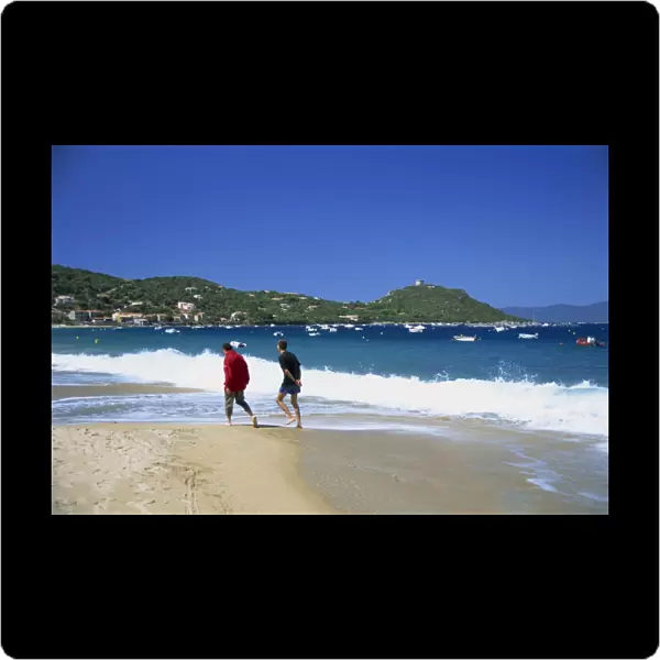 Two walkers on the beach, Campo Moro, Corsica, France, Mediterranean, Europe