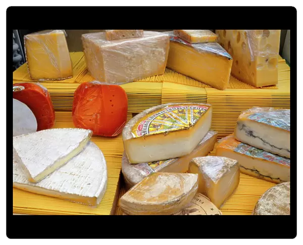 Assorted French cheeses on a market stall