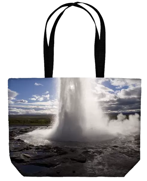 Strokkur (the Churn) which spouts up to 35 meters erupting