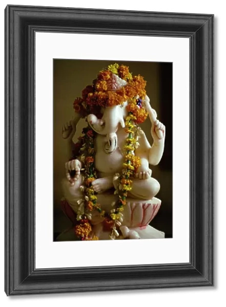 Garlands on statue of the Hindu God Ganesh