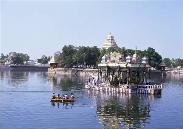 A barge carrying images of Shiva and Meenakshi being