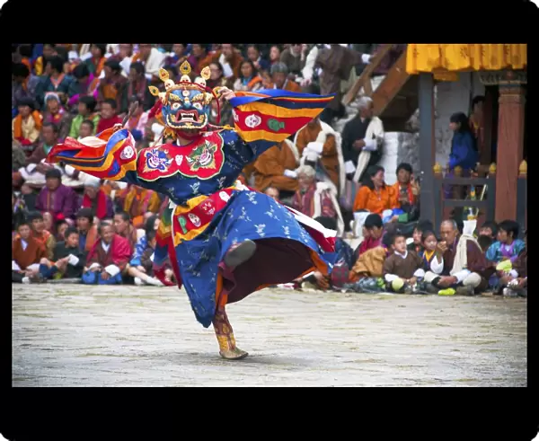 Traditional dancers at the Paro festival, Paro, Bhutan, Asia