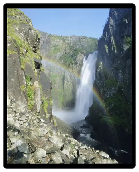 Rainbow and Voringsfossen waterfall