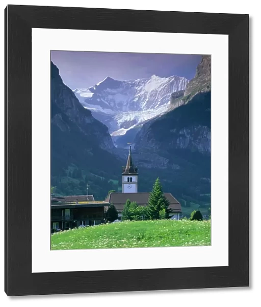 Village church and Oberer Grindelwald Glacier