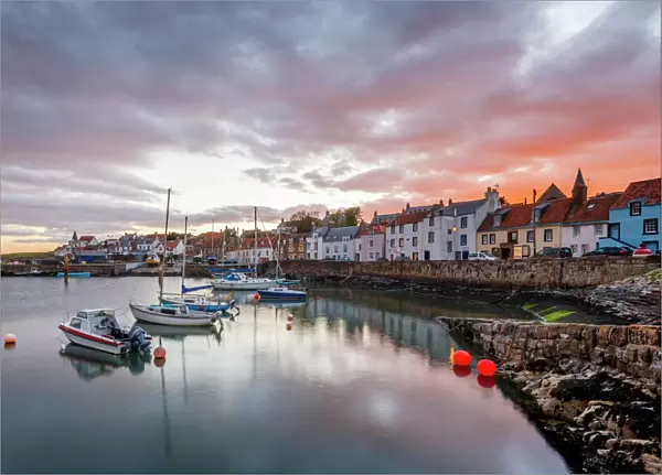 Sailing boats at sunset in the harbour at St. Monans, Fife, East Neuk, Scotland, United Kingdom