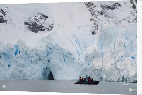 Tourists at the edge of ice shelf, Skontorp Cove, Paradise Bay, Antarctica, Polar Regions