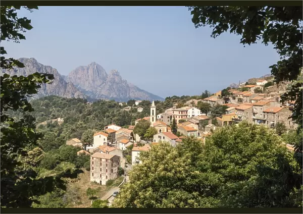 The old citadel of Evisa perched on the hill surrounded by mountains, Southern Corsica