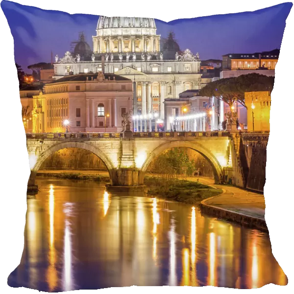 St. Peters Basilica in Vatican City lit up after dark and Tiber River, Rome, Lazio