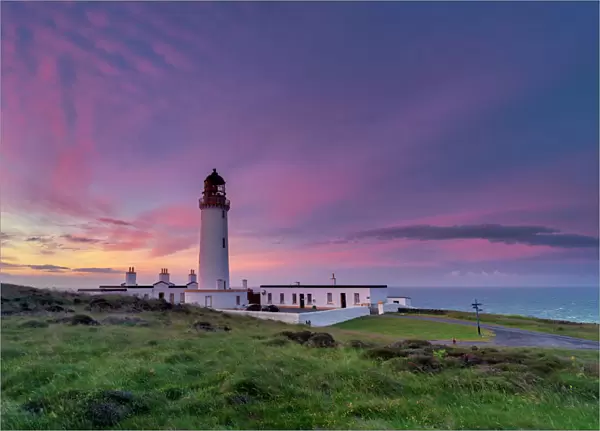 Mid-summer sunrise over The Mull of Galloway Lighthouse