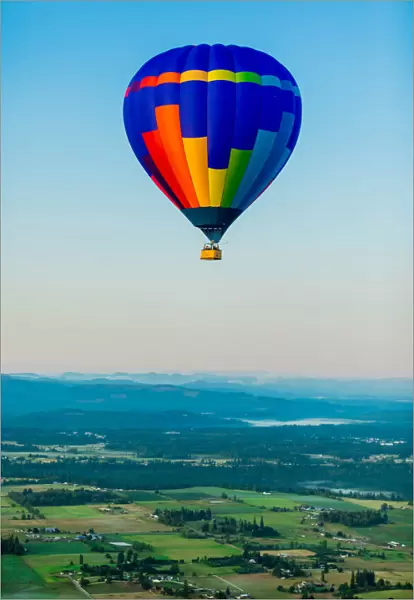 Hot air balloon over Auburns farmland, Washington State, United States of America