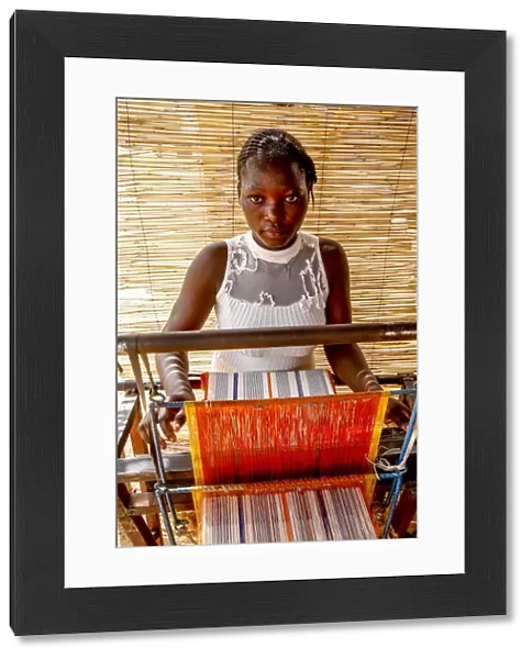 Young weaver in Koudougou, Burkina Faso, West Africa, Africa