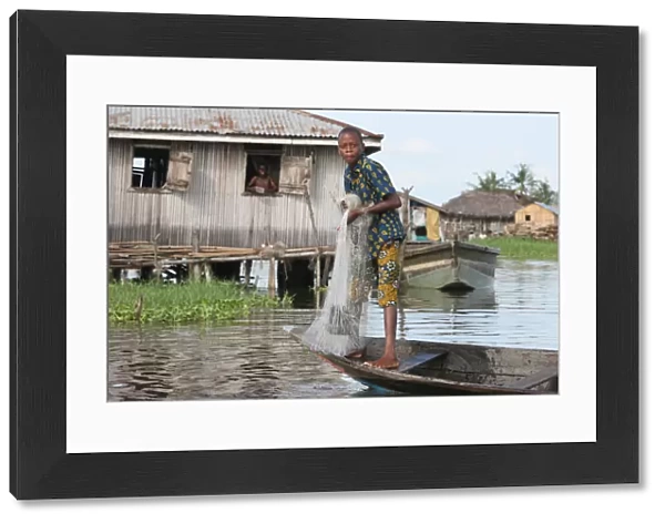 Fishing in Ganvie lake village on Nokoue Lake, Benin, West Africa, Africa