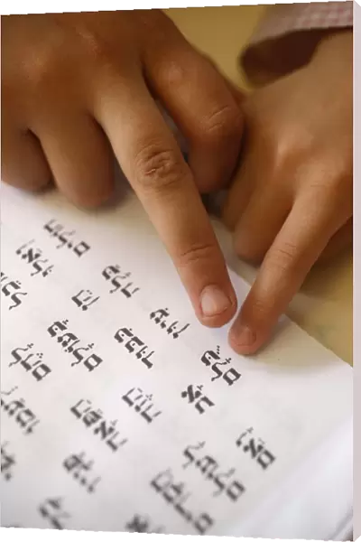 Child learning Hebrew in Jewish school, Paris, France, Europe