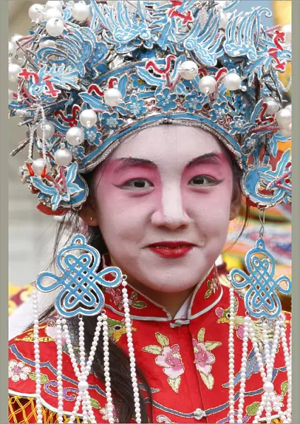 Young woman wearing traditional costumes, Chinese New Year, Paris, France, Europe