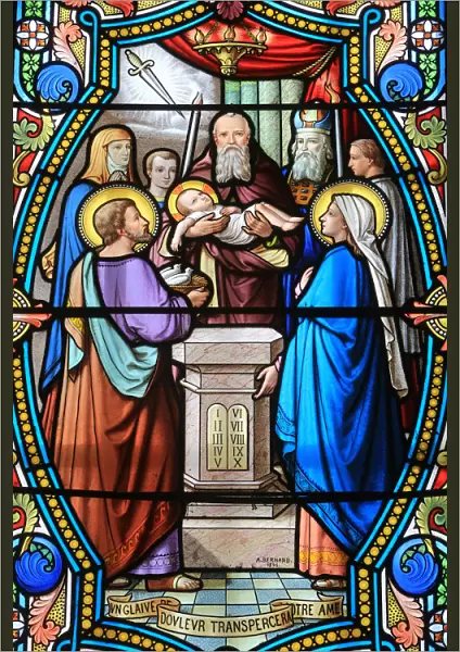 Stained glass window of Presentation of Jesus Christ at the Temple
