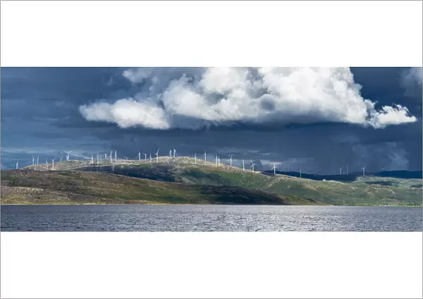 Wind turbines under a stormy sky, Troms county, Norway, Scandinavia, Europe