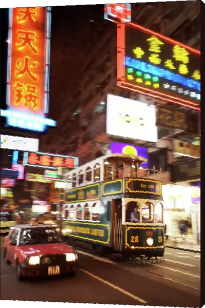 Tram and taxi with neon lights, Hong Kong, China, Asia