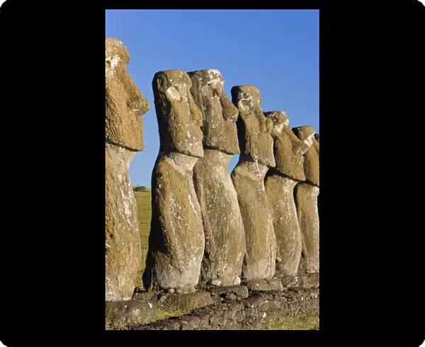 Row of monolithic stone Moai statues known as Ahu Akivi, Rapa Nui (Easter Island)