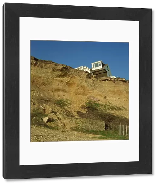 House about to topple over cliffs, Barton-on-Sea, Hampshire, England, United Kingdom