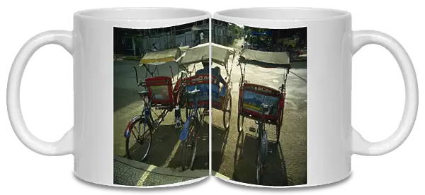 Parked becaks (trishaws), Bogor, West Java, Indonesia, Southeast Asia, Asia