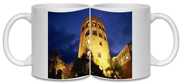 Harbourside watchtower illuminated at night, Puerto Banus, Marbella, Andalucia