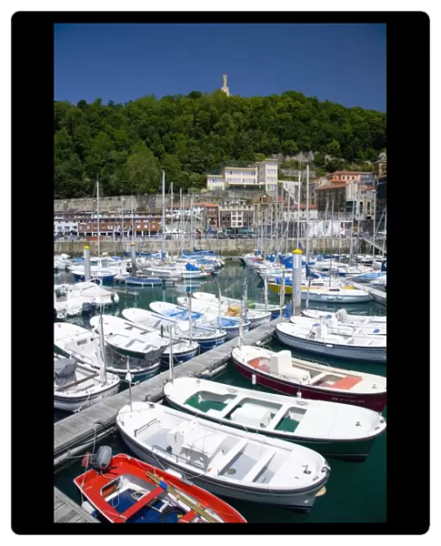 View across the harbour to the wooded slopes of Monte Urgull, San Sebastian