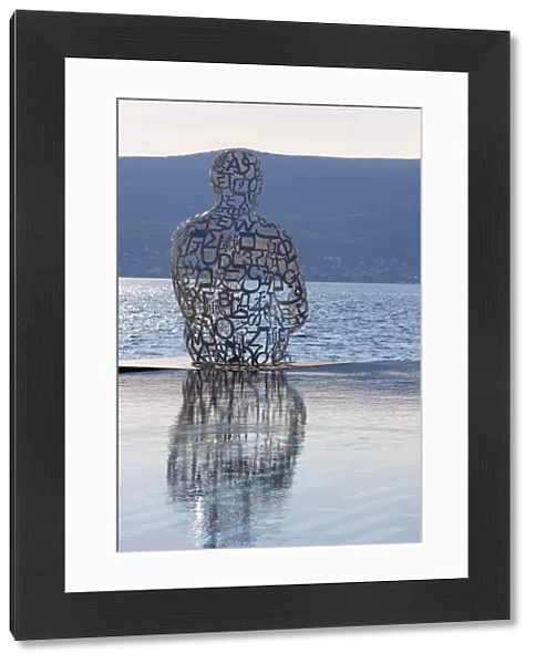 Sculpture of a man made of letters at the Lido Mar swimming pool at the newly developed Marina in Porto Montenegro