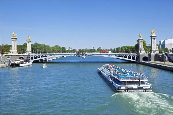 River Seine Cruise boat, Bateaux Mouches and the Pont Alexandre III Bridge, Paris, France, Europe