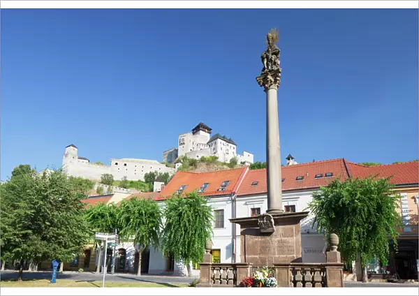 Monument in Mierove Square and Trencin Castle, Trencin, Trencin Region, Slovakia, Europe