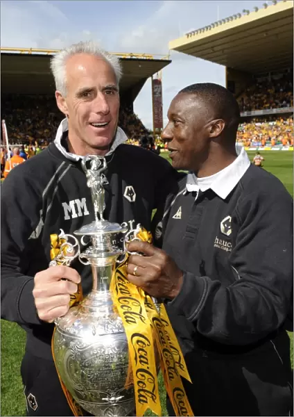 Wolverhampton Wanderers: Mick McCarthy and Terry Connor Celebrate Championship Title with the Trophy
