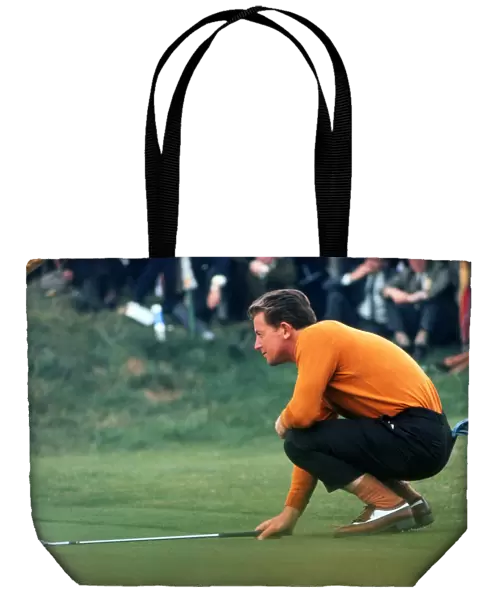 Maurice Bembridge lines up a putt during the 1969 Ryder Cup