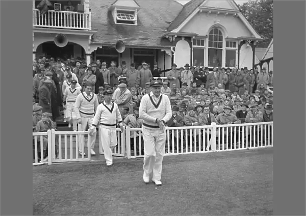 Don Bradman leads his Australia team out for the first game of their 1948 tour of England